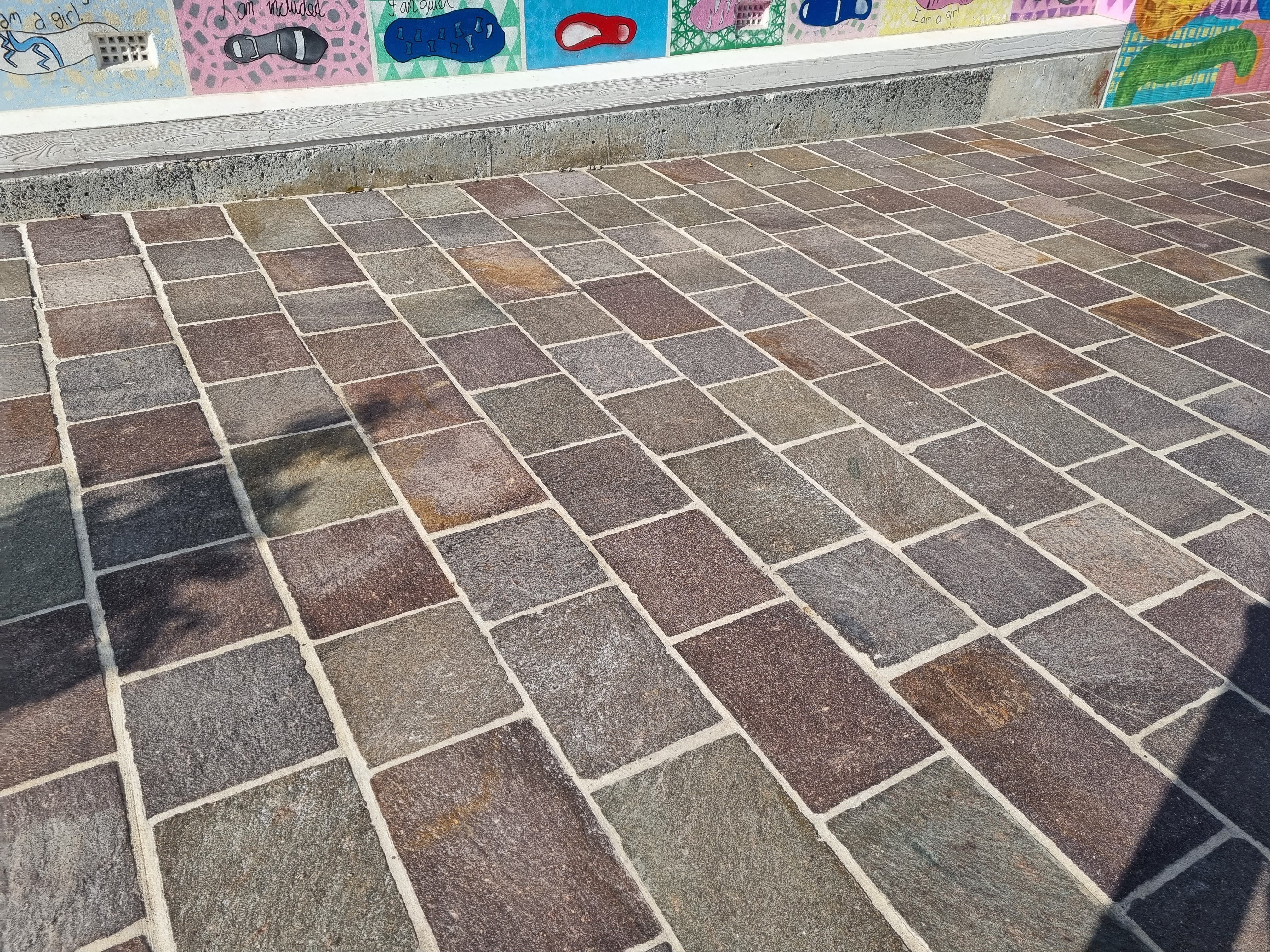 Porphyry pavers laid in a public plaza